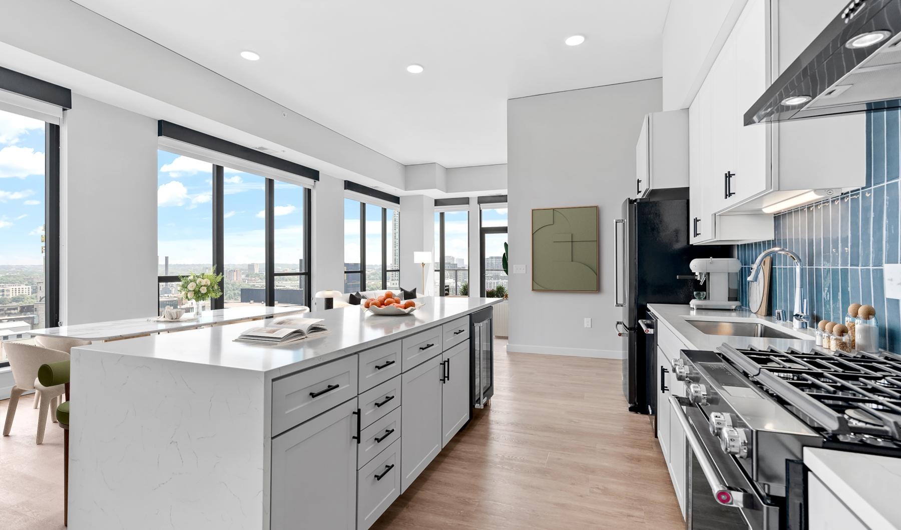 Settle into comfort at 240 Park a kitchen with a large island