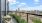 a balcony overlooking a city