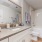 a bathroom with a large mirror