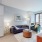 a living room with a couch and tables
