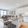 a kitchen with white cabinets